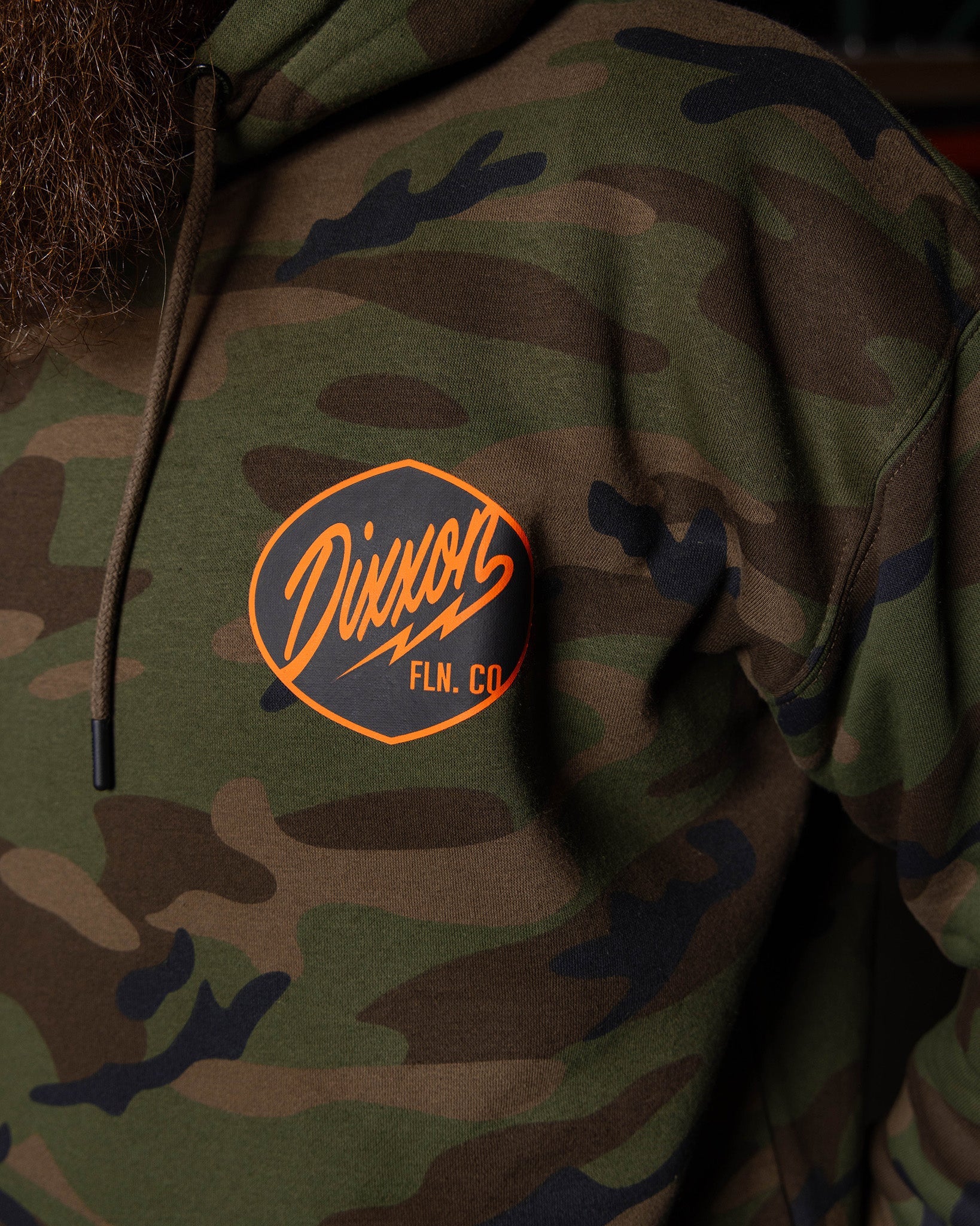 Dixxon's Black & Orange Esso Hoodie - Green Camo | Shop Now