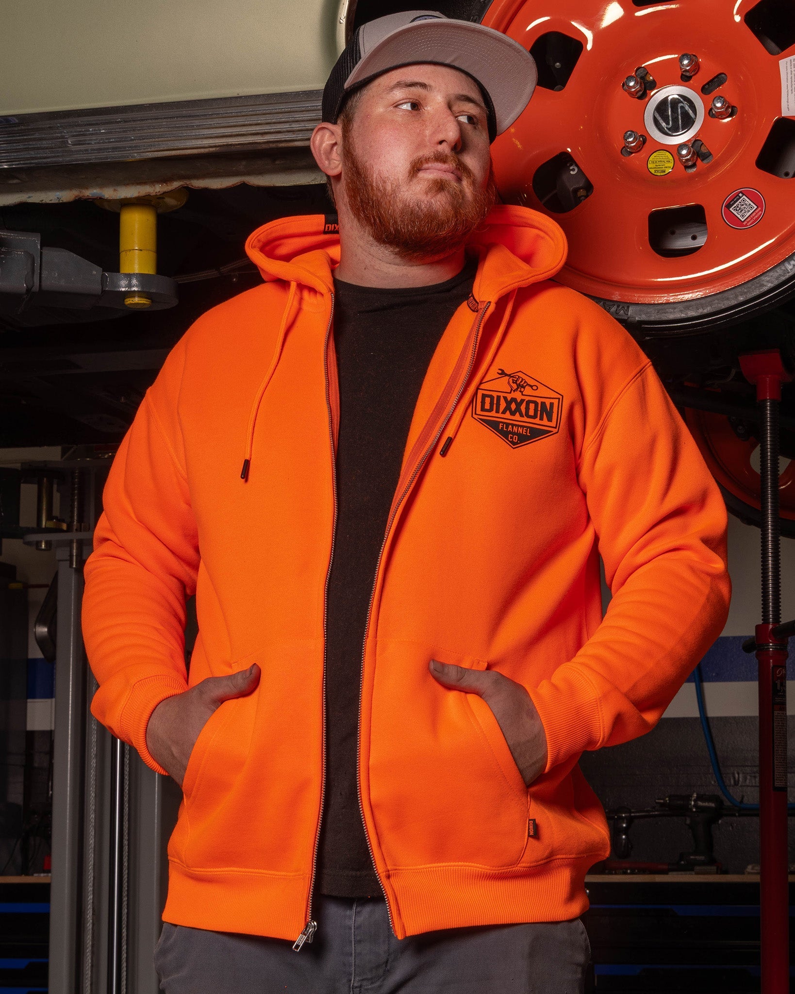 Dixxon Black Hoodie: Safety Orange & Working Class Style