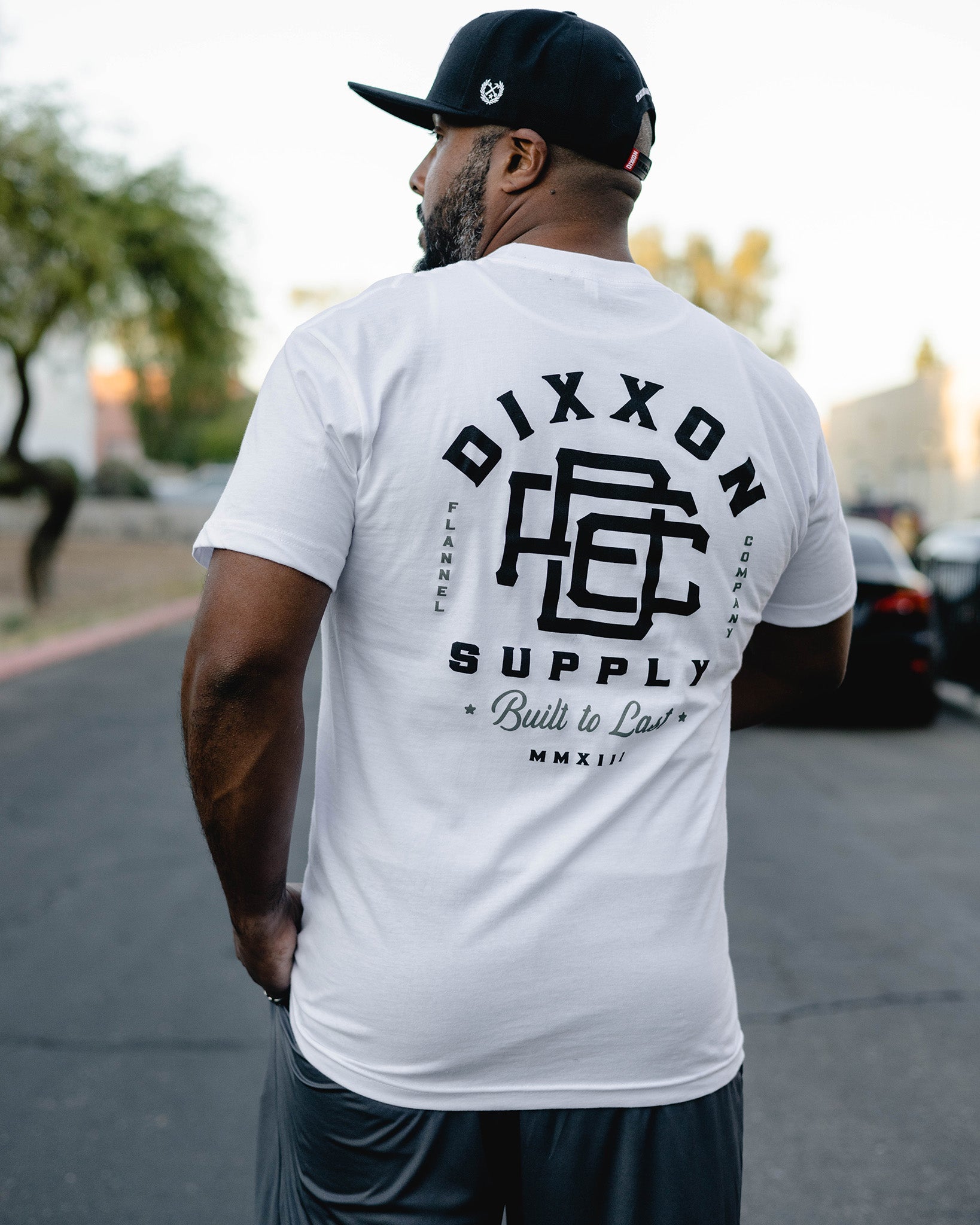 Built to Last White Tee by Dixxon: Shop Now