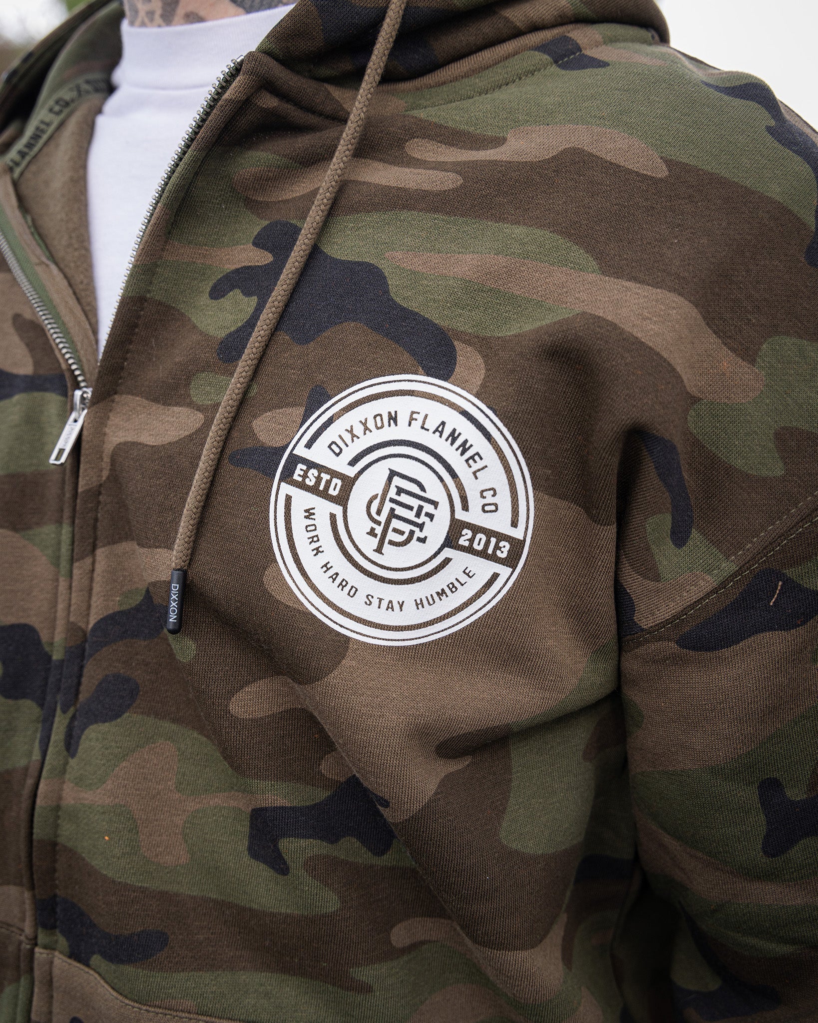 White Work Hard Badge Zip Up - Camo - Dixxon Flannel Co.