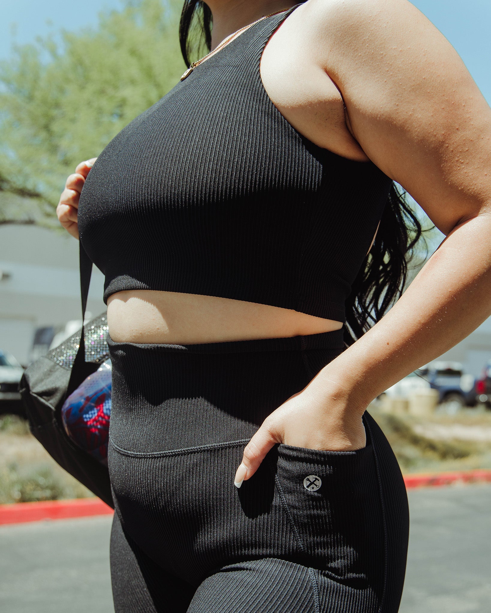 Black Ribbed Crop Top by Dixxon: Shop Now