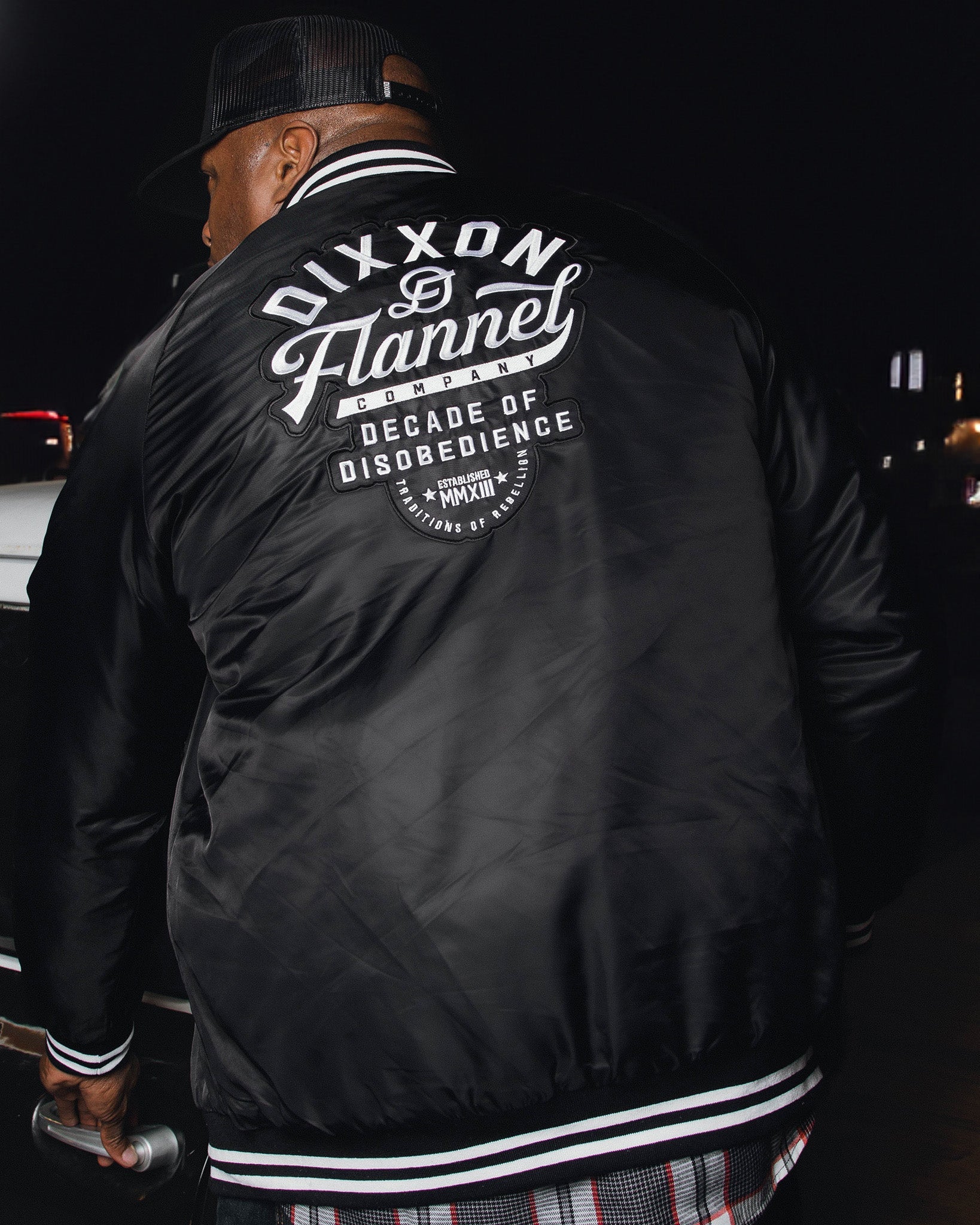 Dixxon Black Varsity Jacket: Shop Now