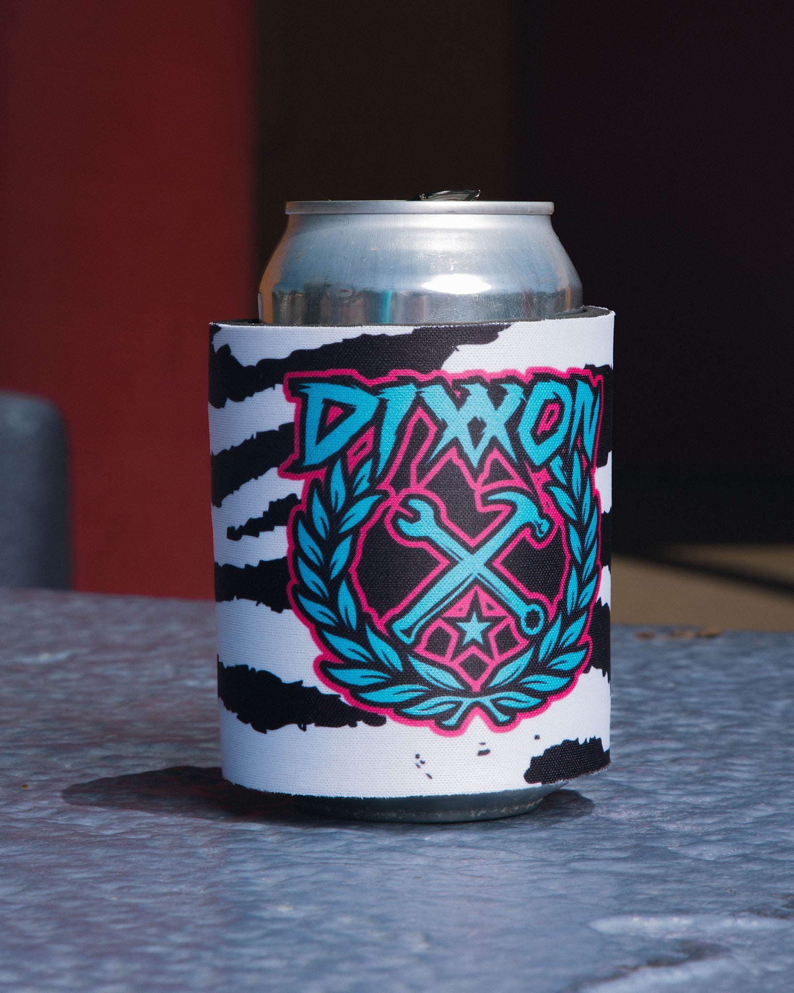 https://www.dixxon.com/cdn/shop/products/party-animal-snap-koozie-can-cooler-352959.jpg?v=1685757866